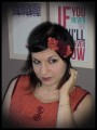 Black headband w/ orange and dark red flowers