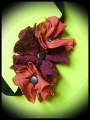 Black headband w/ orange and dark red flowers