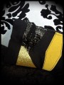 Black zippered purse gold glitter details