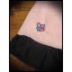 Pink skirt w/ black ruffled hem and hearts applique - size S