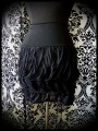 Black skirt with cascade ruffles - size S/M