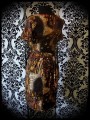 Brown yellow black dress with golden applique - size S/M